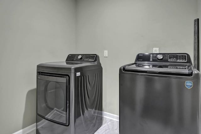 laundry area with washer and dryer