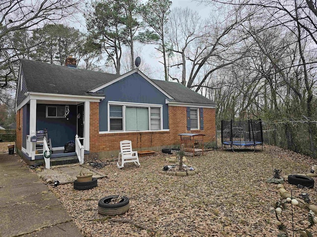 view of front of home featuring a trampoline