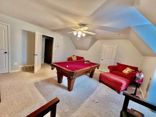 rec room featuring lofted ceiling, light colored carpet, ceiling fan, and billiards