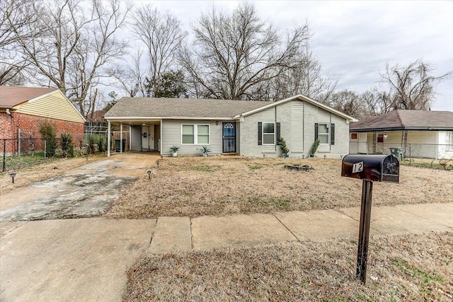 single story home with a carport