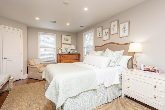 bedroom with hardwood / wood-style floors