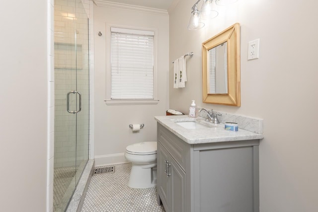 bathroom featuring toilet, crown molding, an enclosed shower, and vanity