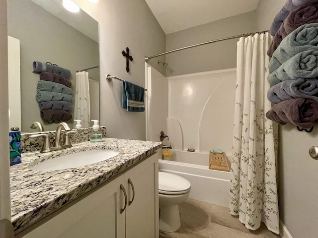 full bathroom featuring tile patterned floors, vanity, toilet, and shower / tub combo