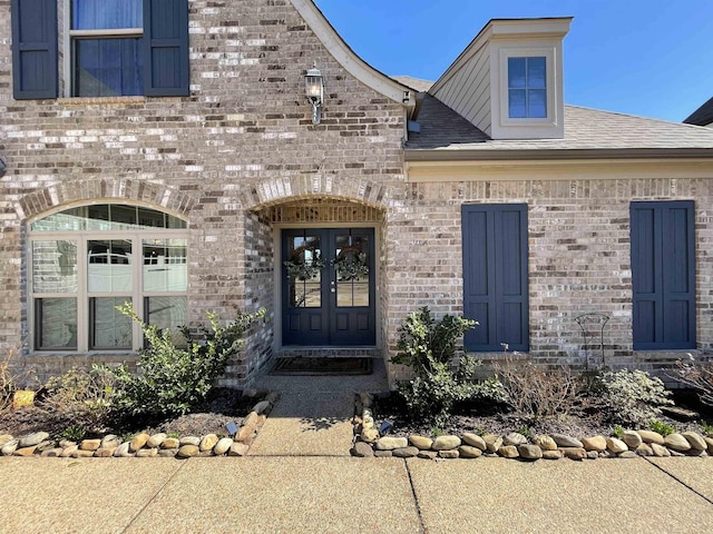 property entrance featuring french doors