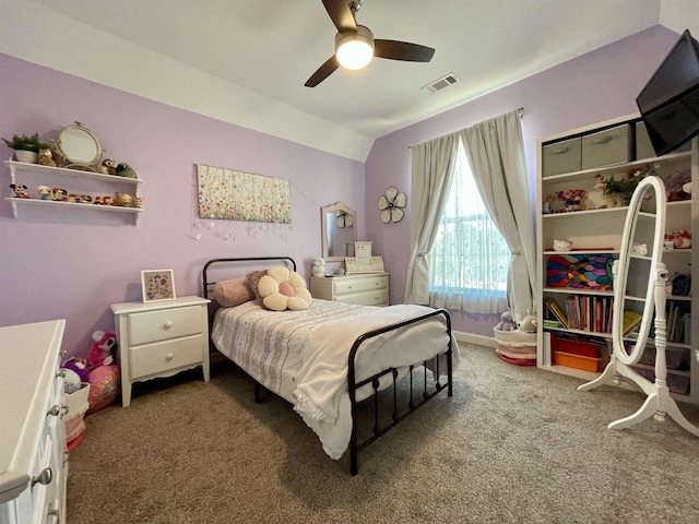 bedroom featuring vaulted ceiling, carpet, and ceiling fan