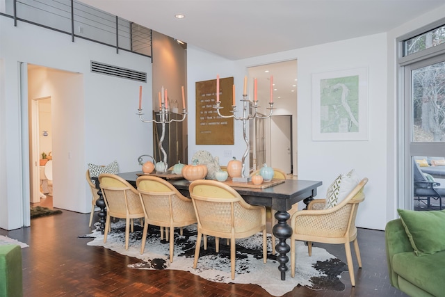 dining room with dark hardwood / wood-style floors