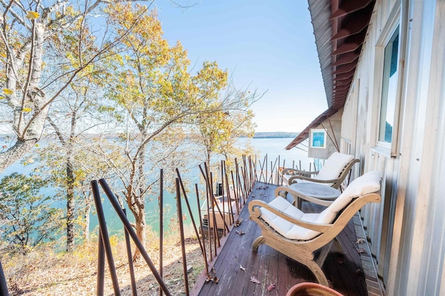 balcony featuring a water view