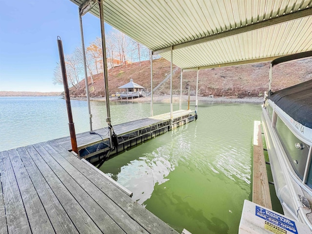 dock area featuring a water view