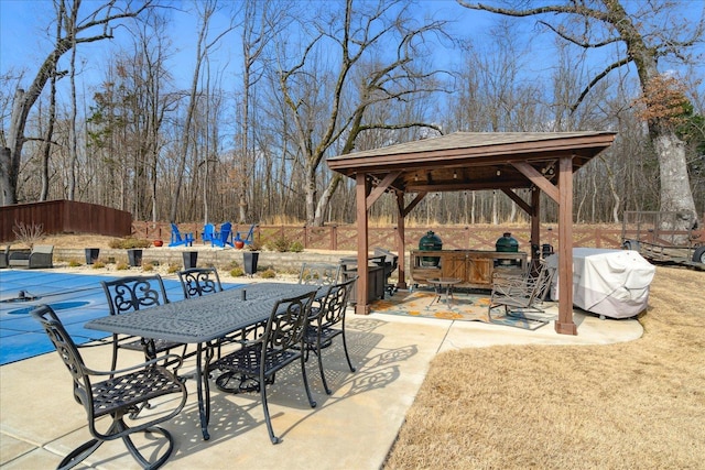 view of patio / terrace featuring area for grilling and a gazebo