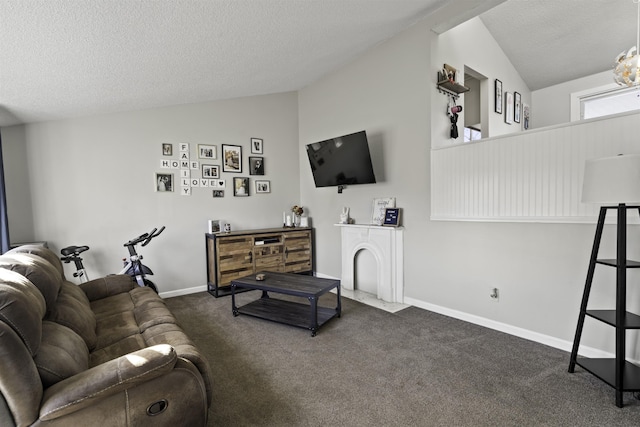 carpeted living room featuring a textured ceiling and lofted ceiling