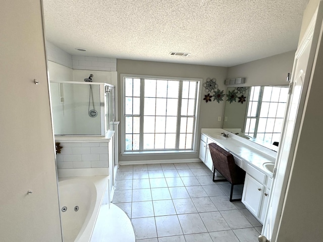 bathroom with a sink, visible vents, a whirlpool tub, double vanity, and a stall shower