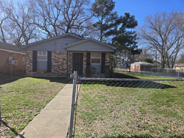 view of front of property with cooling unit and a front yard