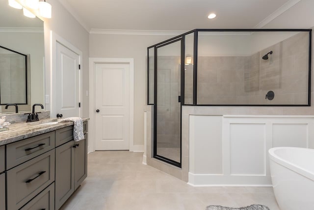 bathroom featuring ornamental molding, vanity, shower with separate bathtub, and tile patterned floors