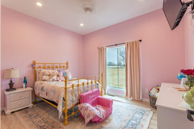 bedroom featuring light wood-type flooring