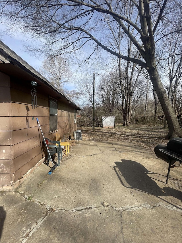 view of yard with central air condition unit