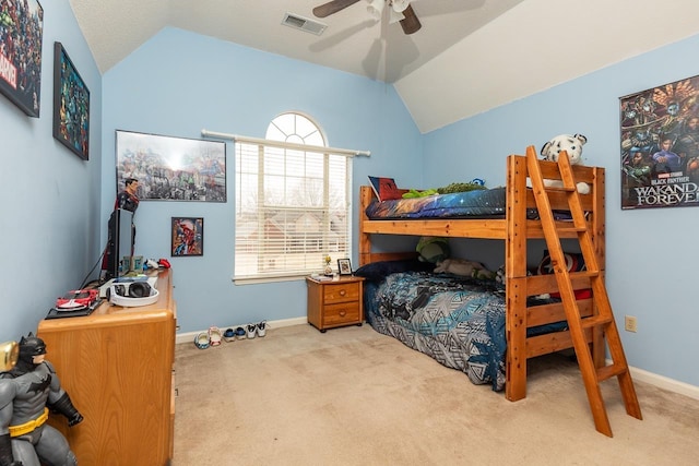 carpeted bedroom featuring ceiling fan and vaulted ceiling