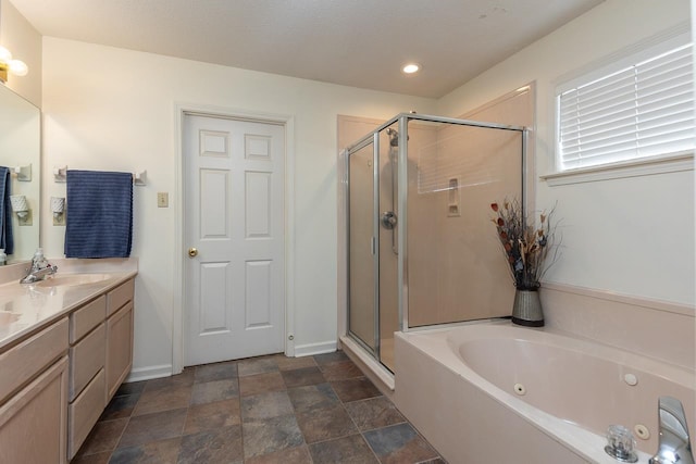 bathroom with shower with separate bathtub and vanity