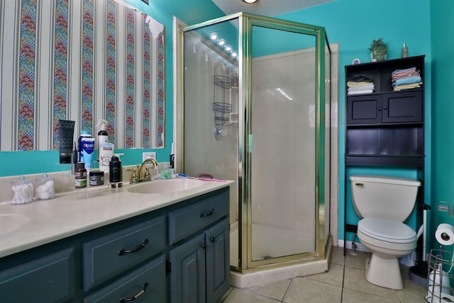 bathroom with toilet, tile patterned flooring, an enclosed shower, and vanity