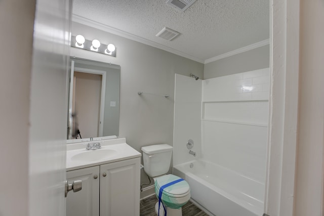 full bathroom with shower / washtub combination, vanity, a textured ceiling, crown molding, and toilet