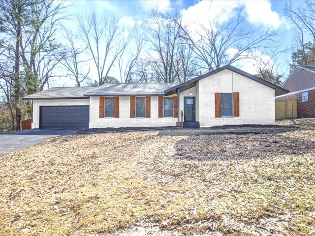 ranch-style home with a garage