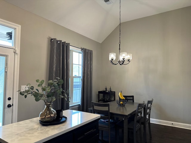 dining area with visible vents, baseboards, vaulted ceiling, dark wood finished floors, and an inviting chandelier