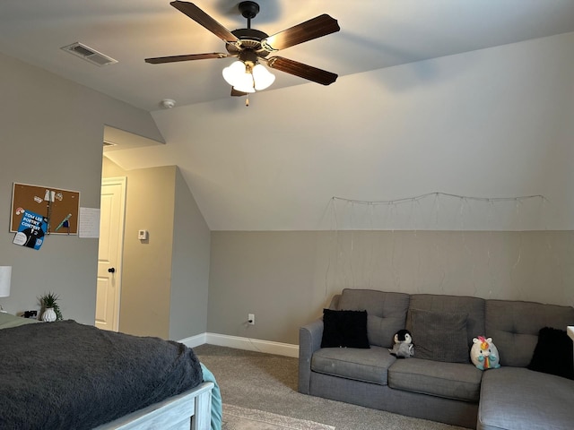 bedroom featuring ceiling fan, carpet flooring, visible vents, baseboards, and vaulted ceiling