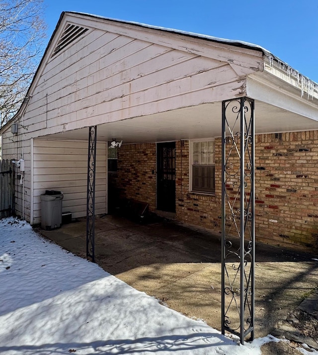 view of snow covered patio