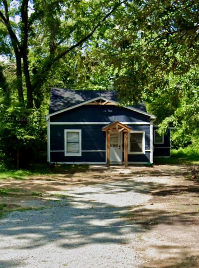 view of outbuilding featuring driveway