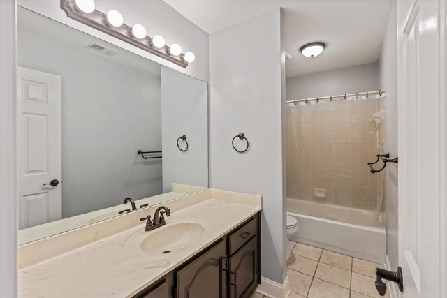 bathroom featuring visible vents, toilet, tile patterned flooring, shower / bathtub combination with curtain, and vanity