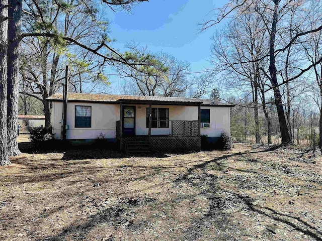 view of front of house featuring metal roof