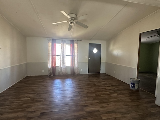 entryway featuring ceiling fan and dark wood-type flooring