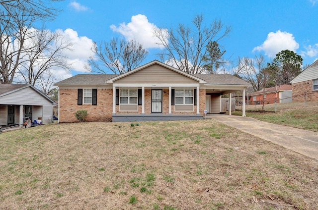 ranch-style home featuring an attached carport, covered porch, brick siding, and concrete driveway