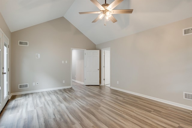 interior space featuring baseboards, visible vents, and light wood-style floors