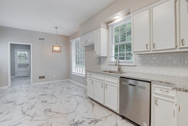 kitchen with marble finish floor, visible vents, backsplash, stainless steel dishwasher, and a sink