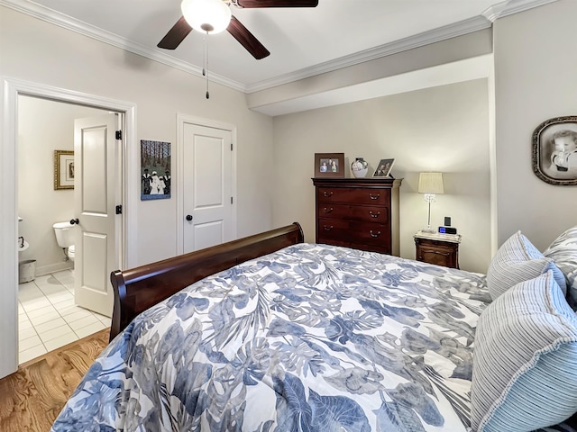 bedroom with ceiling fan, crown molding, ensuite bathroom, and light tile patterned floors