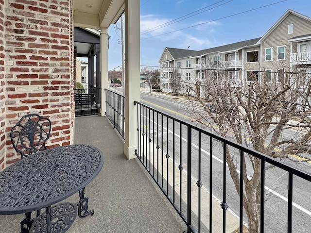 balcony featuring a residential view