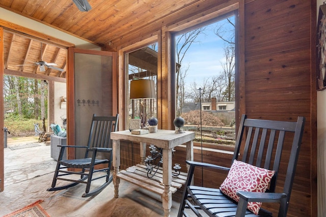 interior space featuring wood ceiling and vaulted ceiling