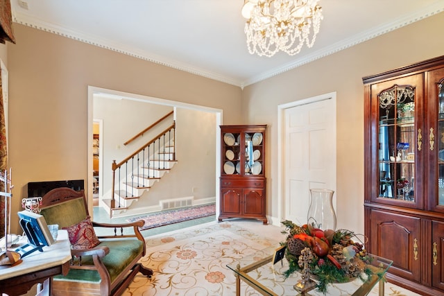 sitting room featuring visible vents, baseboards, stairway, ornamental molding, and an inviting chandelier