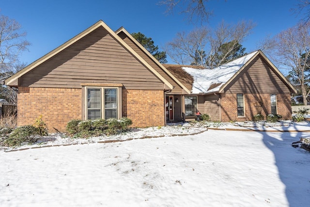 exterior space featuring brick siding