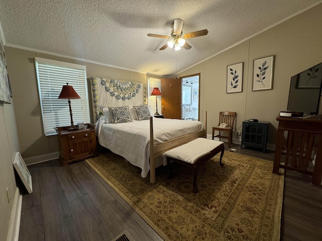 bedroom featuring dark wood-style floors, crown molding, lofted ceiling, a ceiling fan, and a textured ceiling