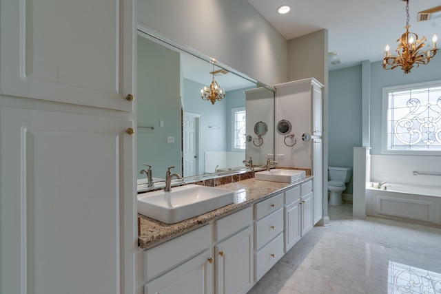 full bathroom with toilet, a sink, visible vents, and an inviting chandelier