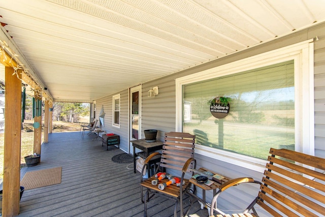 deck with covered porch