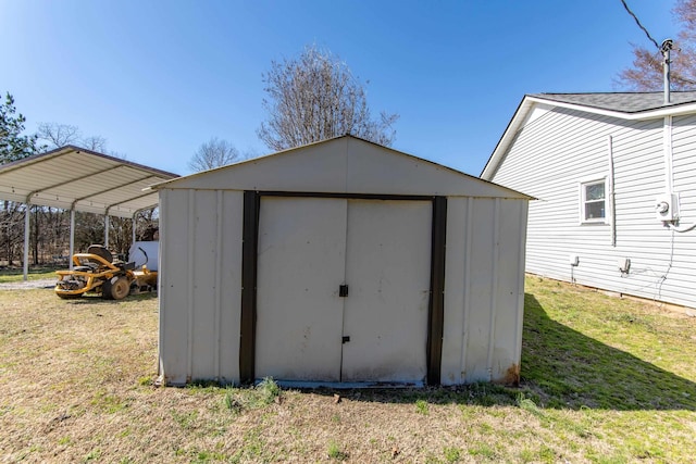 view of shed with a carport