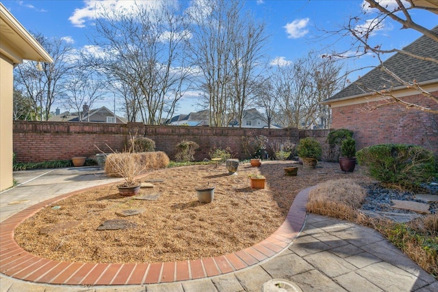962 E Riverwalk Dr E, Memphis, TN 38120 - view of yard featuring a fenced backyard and a patio