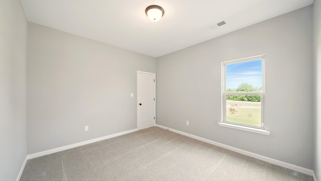 1405 Armstrong Rd, Drummonds, TN 38023 - spare room with baseboards and light carpet