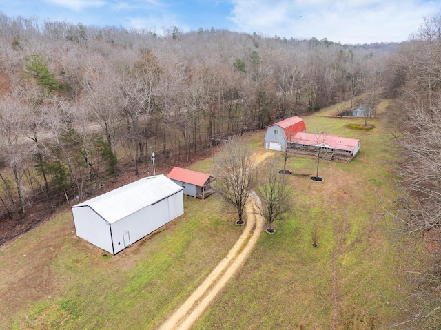 bird's eye view featuring a forest view