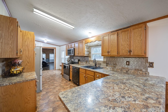 kitchen with stainless steel appliances, lofted ceiling, brown cabinetry, and a sink