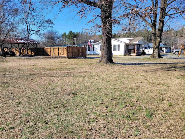 view of yard with fence