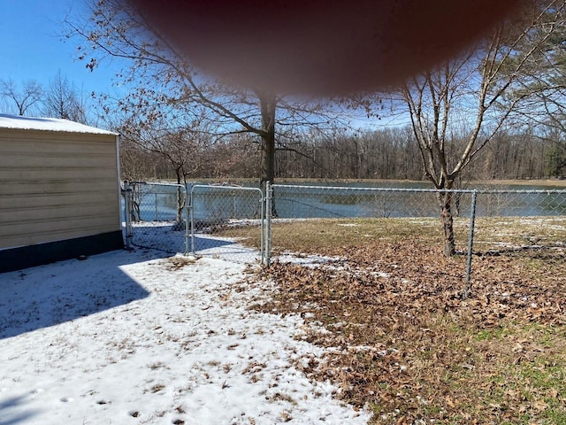 view of yard featuring a gate and fence