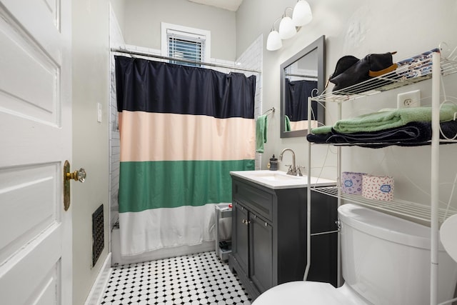 1151 Central Ave, Memphis, TN 38104 - full bath with toilet, shower / bath combination with curtain, and vanity